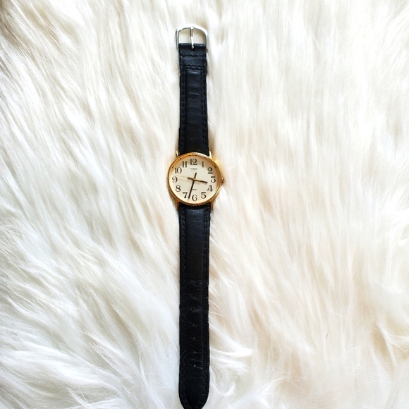 Timex Accessories - Women's timex quartz wrist watch with leather band.